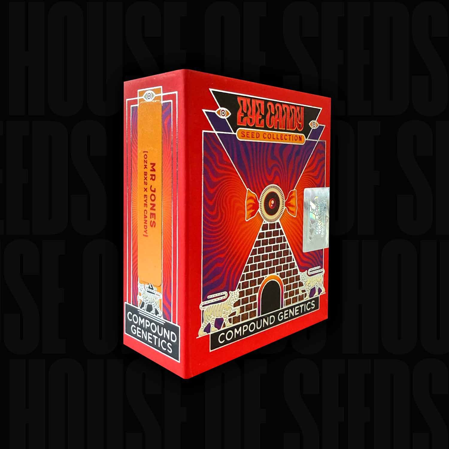 Mr. Jones Saatgutbox von Compound Genetics mit Pyramidenkunstwerk und holographischem Siegel auf dunklem Hintergrund.